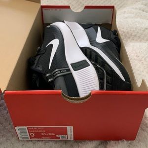 Brand new never worn Nike Reposto shoes. Black whit and smoke gray.